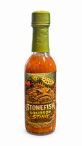 Stonefish Soursop Sting hot sauce bottle centered on a black branded background with repeating stonefish graphics and logo text